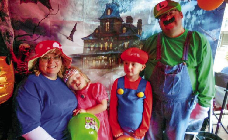 Matt Nix, dressed as Luigi, wins the adult male category in the Memphis Chamber of Commerce Halloween Costume Contest Saturday, Oct. 28, earning $50. “It was so very hard for our board to pick,” Memphis Chamber of Commerce Manager Kim Cloyd said. “We thank you all for the fun and for entering our contest.” Photos by Memphis Chamber of Commerce