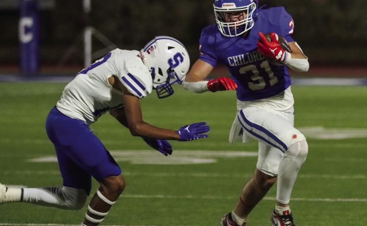 Childress’ Crewz Keys dodges a Stratford Elk Friday, Oct. 4 at Fair Park Stadium. Photo by Childress High School Yearbook Staff