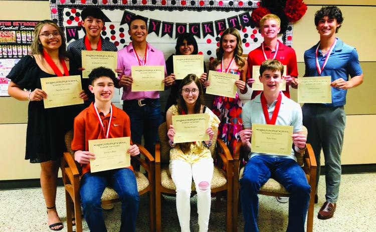 Freshman students accept Top 10 accolades at the Wellington High School (WHS) Awards Assembly at 5:30 p.m. Monday, May 12 at the WHS auditorium in conjunction with the Lady Rocket and Skyrocket Sports Banquet. Front row, from left: Jaxon Collins, first; Natalee Hudson, second; Kyler Keys, third (tie). Back row, from left: Natalee Alvarado, third (tie); Leo Granadoz, fifth; Alex Orozco, sixth; Anali Cortez, seventh; Kambrie Fisher, eighth; Jax Heflin, ninth; Lawson Inman, 10th. The Red River Sun/Bev Odom