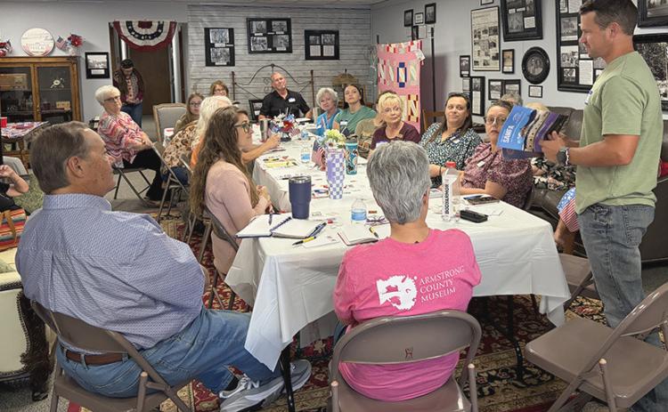 Explore West Texas Publisher Ramon Johnston, of Lubbock, displays the Fall 2026 issue featuring San Angelo Museum of Fine Arts on the back cover where Panhandle Area Museum Directors gathered Monday, Sept. 14, at the Collingsworth County Museum. INTREPID PHOTO / BEV ODOM