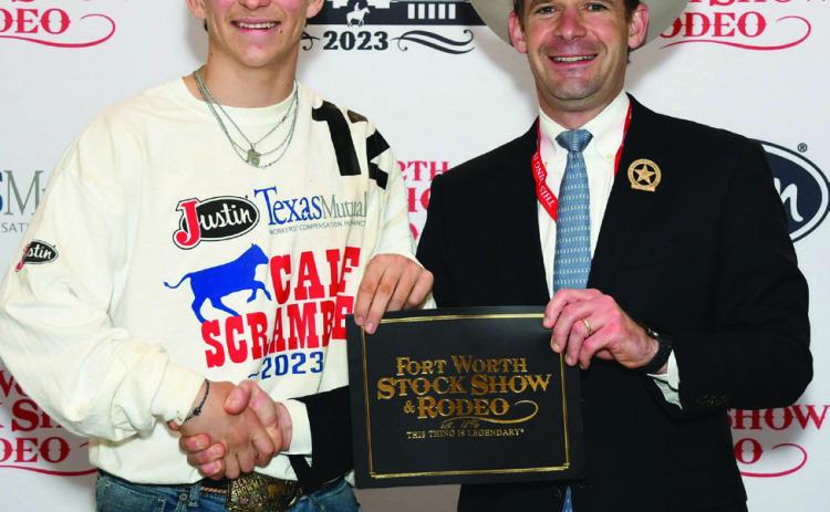 Childress County 4-H member Drake Rabe wins a $500 purchase certificate toward a beef or dairy heifer for exhibition at next year’s Forth Worth Stock Show and Rodeo. The certificate, presented by Stock Show Calf Scramble Committee Chairman Paxton Motheral, was sponsored by Frost. Photo Courtesy of Fort Worth Stock Show and Rodeo