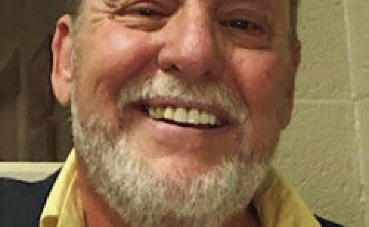JOHN R. BALLEW