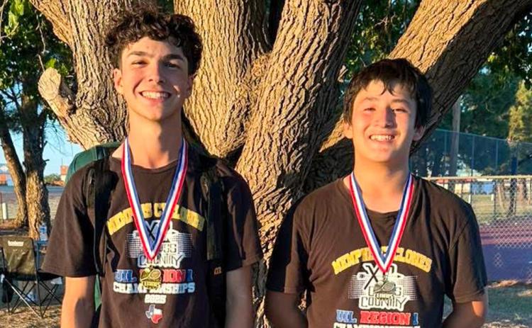 Memphis’ Kyler Robison, left, takes first place in the boys’ singles Monday, May 11 at the Memphis Tennis Tournament, followed by fellow Cyclone Leo Zarate, who finished second. MEMPHIS ISD