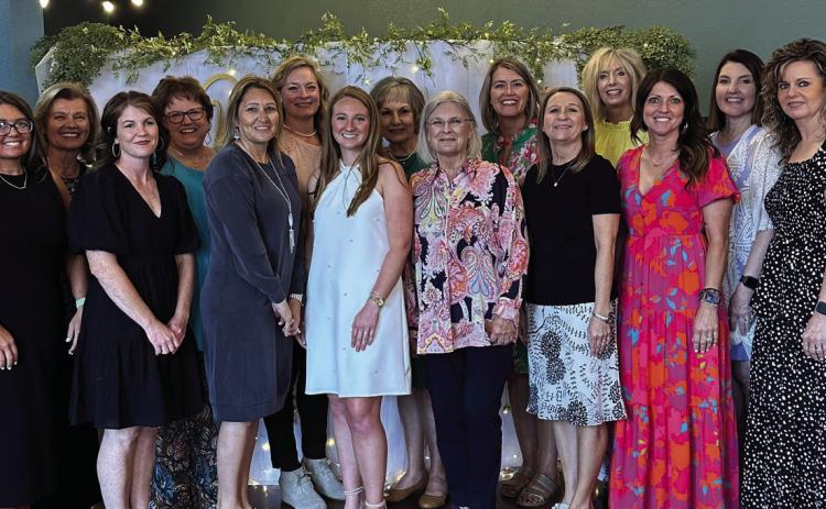 Family and friends gather to shower Kenna Darrow, bride-elect of Tyler Smith, with love and best wishes at a beautiful wedding shower held on Sunday, April 27 at the Lewis Building. Courtesy Photo