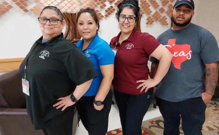 Housekeeping Supervisor Silvia Saucedo, left, Sara Gonzalez, Yasmin Rios and Anthony Evans are among nine staff members who maintain housekeeping at Childress Regional Medical Center and Fox Rural Health Clinic. Other staffers are Rafael Chacon, Maria Ramirez, Irene Martinez, Sharon Pyles and Adelita Lara. Grace Holman