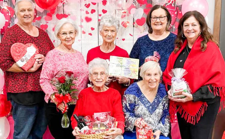 Members of Wellington Senior Citizens Center display door prizes won at the 6 p.m. Friday, Feb. 13 Valentine’s Day social at the Bura Handley Community Center. The Plaza Restaurant, of Childress, catered the festive event, providing beef and chicken fajitas, sides, dessert and drinks. Front row, from left: Sallie O’Hair, LaJaunda Ressell. Back row, from left: Debra Belew, Carolyn Keller, Pat Roberson, Marie White, Margret Wood. Wellington Senior Citizens Center