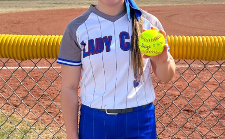 Addi Baize hits the first home run of the season Thursday, Feb. 15, as the Lady Cats took down the Olney Lady Cubs during the Tigerette Classic in Jacksboro.