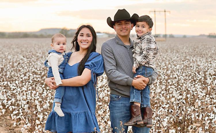 The late Sergio Romero will be honored Saturday as his family serves as the Parade Marshals for the Hall County Picnic in Memphis. Romero is shown here holding his son Julian and with his wife, Francisca, holding their other son, Elias. COURTESY PHOTO