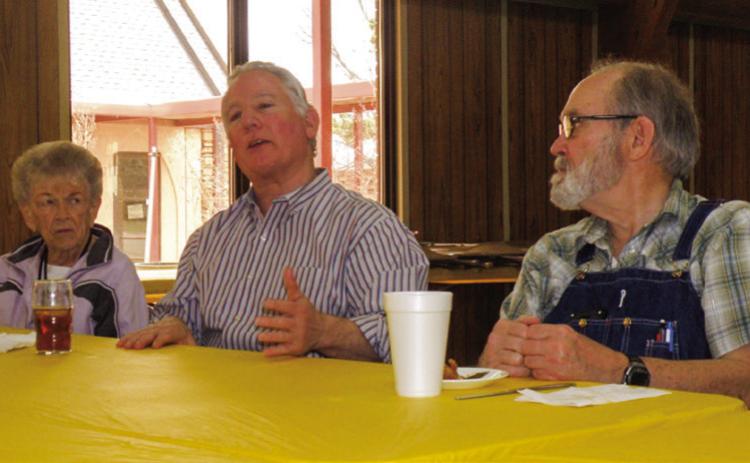 Greg Buckley, center, relates his experience on “American Pickers,” aired on the History Channel, at the Adult Fellowship Luncheon at the Childress Methodist Church. The episode, “Law and Horader,” which featured Buckley’s collection of antiques aired in August 2015. He was described on the show “laying down the law during the day and collecting antiques at night,” a nod to his job as Childress County Attorney. From left: Anne Fromm, Buckley, Harvey Dobbs. Photo by Grace Holman