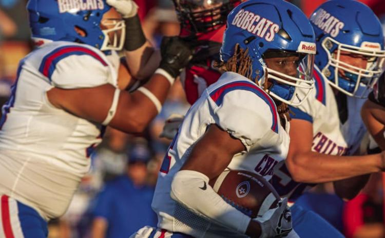 Childress running back Kobe Sims looks for running room against the Frederick Bombers Friday, Sept. 13 at Bomber Bowl in Frederick, Okla. Press Pass Sports/Nicole Dill