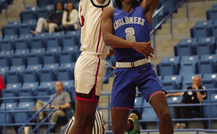 Childress’ Lamont Nickleberry attempts a layup against the Levelland Lobos during the Childress Rotary Holiday Invitational Thursday, Dec. 8. Childress High School Yearbook Staff