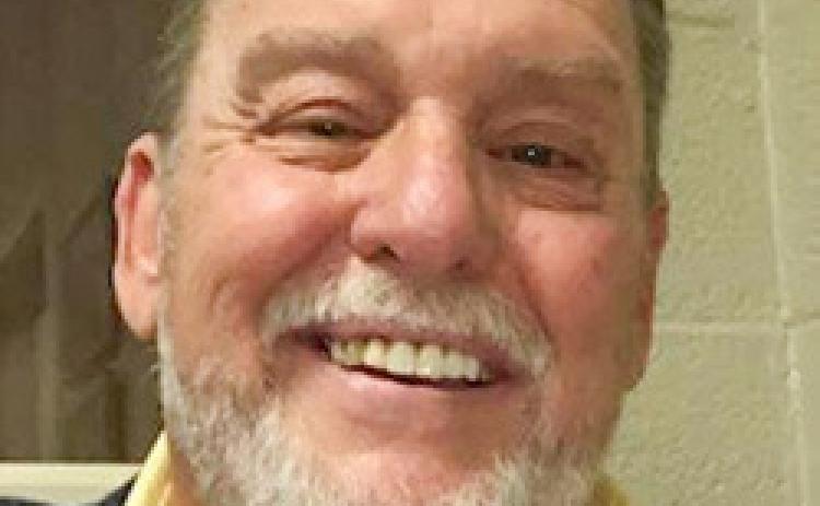 JOHN R. BALLEW