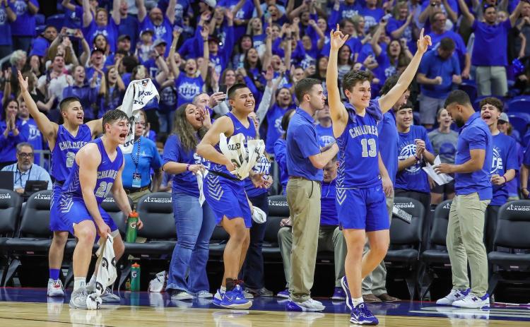 In March, the Childress Bobcats, including Jesus Jalomo (23), Scout Smith (20), student athletic trainer Rebekkah Guzman, Isaiah Jalomo, coach Wayne Parker, Billy Moore (13) and coach Caleb Tucker, celebrated a historical season, advancing to the state championship for the first time since 1944. Photo by Robbie Rakestraw