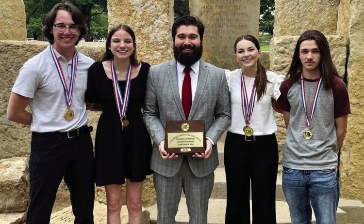 The Childress High School Accounting team, including Darren Pratt, Kara Palomo, Meg Ridens and Emmett Holton, advance to the upcoming 2023 UIL Academic State Meet after earning the Regional Championship at the regional meet. The team is coached by Jeffrey Collins, center.