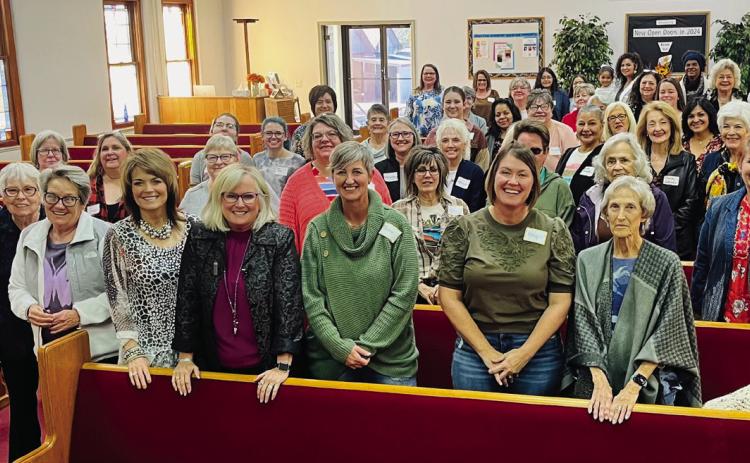 Nationally known speaker, artist and author Debbie Hannah Skinner, of Amarillo, center, shares her freedom of heart message at Wellington Nazarene’s recent Ladies Spark Day. Skinner emphasized the freedom of heart found in the Lord in Psalm 139, as she modeled her wisdom in watercolor, painting the beautiful heart piece. Photos Courtesy of Wellington Nazarene Church