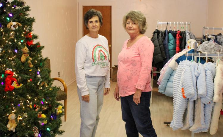 Childress County Christmas Sharing board members Raenell Smith, left, and Durlene Worthington prepare for the 2023 holiday season, which met the needs of 58 families, 130 children, 43 elderly and disabled, 50 Childress Healthcare Center residents and 22 Cottage Village Assisted Living residents. The Red River Sun/Elizabeth Tanner
