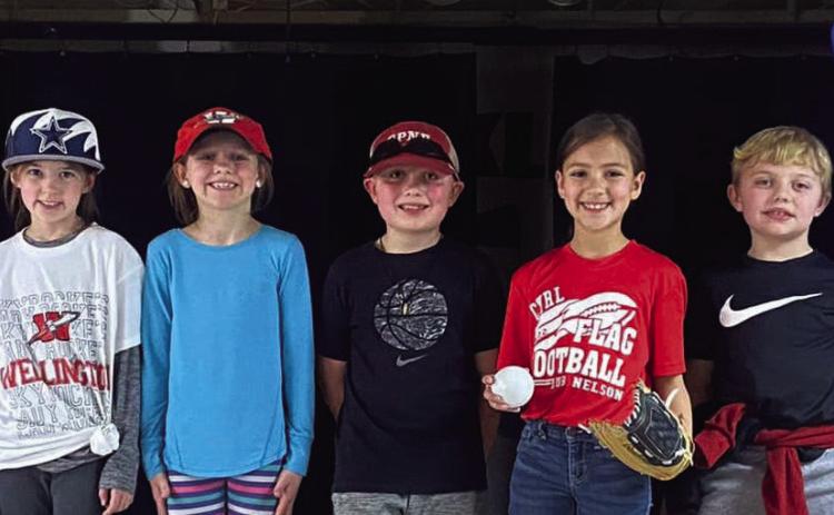 The Wellington Elementary School second-grade cast, performing in a Babe Ruth production, including Colt Dettle, left, Briley Holton, Peyton Roberson, Raylie Sims, Joe Lemons, Sophia Manuel, Quade Weatherly, Callahan Cantu and Dallas Duke, take the stage in the cafeteria. Response to Intervention (RTI) exercises, such as this, build confidence in students to increase success. Courtesy Photos
