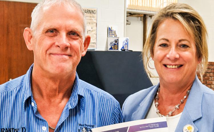 Lions District 2-T1 Governor Deanna Porter presents service pins to Memphis Lions Club members Wednesday, June 10. Receiving pins were Billy David Ballew, 45 years; Daniel Downey, 20 years; and Dickie Cloyd and Dick Hutcherson, 10 years. MEMPHIS LIONS CLUB