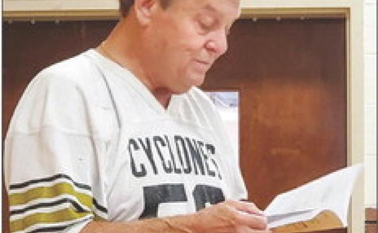 Ballew presents publication to Memphis Lions