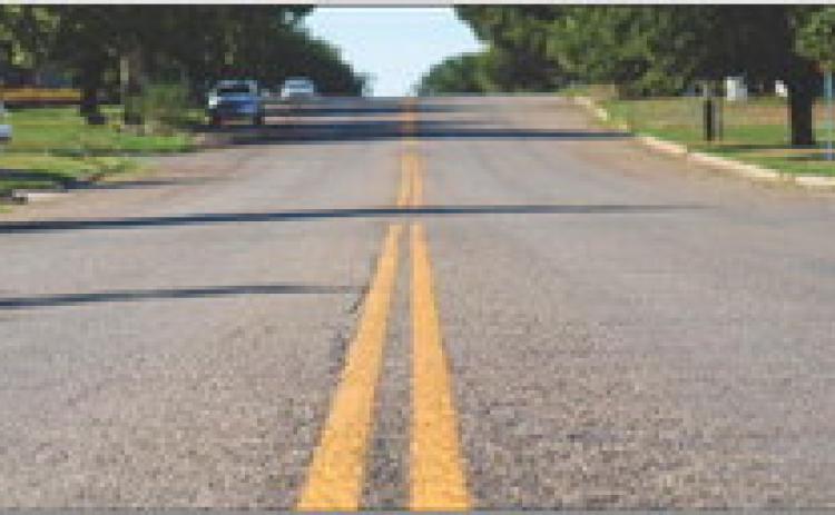 Striped in early August, Childress’ Ave. I became the first street in the United States to use recycled polyethylene terephthalate (PET) thermoplastic compound striping, an eco-friendly product invented and applied by Gyro Solutions’ Dusty Whitaker. The Red River Sun/Elizabeth Tanner