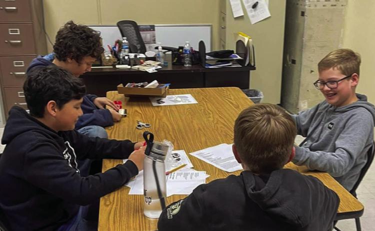 Middle school students build direct current vehicles