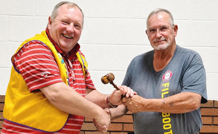 Memphis Lions Club outgoing President Dickie Cloyd, right, passes the gavel back to 2026-2027 President Daniel Downey, who has previously served as the club’s president. Dickie was presented with a plaque of appreciation for his service.