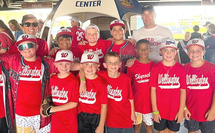 Front, left: Leo Nunez, Landry Mixon, Braxton Sims, Max Orr, Gus Shots, Xander Periera , Luke Roberson, Stratton Wynn, Ezra Peters. Back, left: Coach Marcie Orr, Layton Wynn, Kacen Wiebe, Zackery Nunez, Coach Matt Wynn. COURTESY PHOTO/NATASHA MIXON