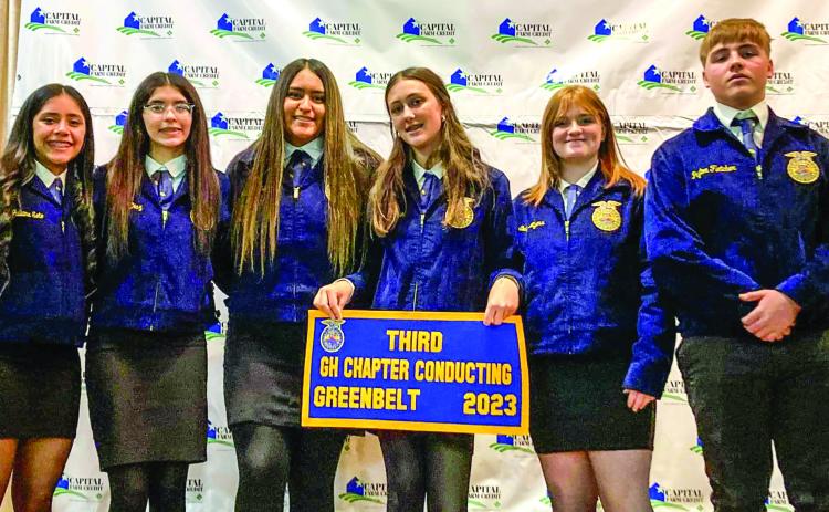 Memphis High School Future Farmers of America members, including, from left, Juliana Soto, Alexis Diaz, Jaqueline Villanueva, Lillie Ollinger, Emily Meyers and Payton Fletcher, accept the third-place Greenhand Chapter Conducting banner during the Greenbelt District FFA Banquet Monday, Dec. 4 in Memphis. Photos Courtesy of Memphis ISD