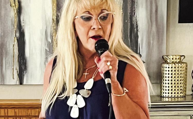 Kiker brings singing ministry toWellington Care Center