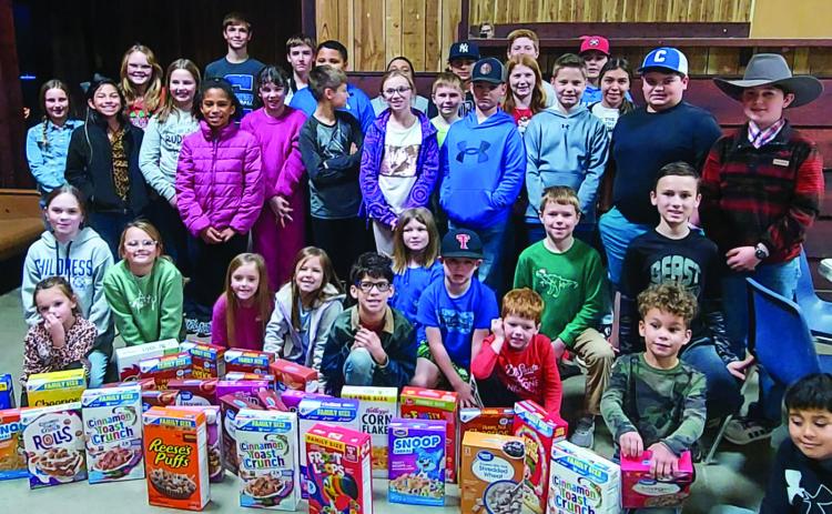 Childress County 4-Hers recently donate boxes of cereal to Food4U Food Pantry of Childress. Food4U, a nonprofit organization providing nutritional assistance to the residents of Childress County, is open from 3-5 p.m. Monday, Wednesday and Friday. Applications can be picked up at Food4U or New4U Thrift Store. Applicants must meet income requirements to receive assistance. Courtesy Photo