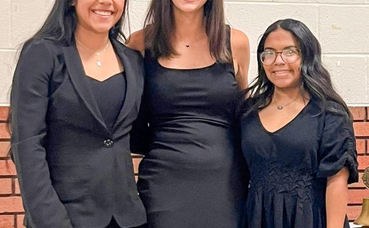 Memphis High School’s Juliana Soto, Lillie Ollinger and Jasmyne Gilchrest compete for a chance at becoming the 2026-2027 Memphis Lions’ Club Queen. Ollinger, center, was crowned with the honor.