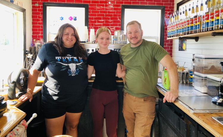 Co-founder Kassidy Barlow, left, barista Alyvia Sorensen and co-founder David Sorensen supervise the Sorensen Wellhouse coffee truck, a.k.a. The Soggy Llama, located at 309 Houston St., just south of Wellington Fairgrounds, on the west side of U.S. Hwy 83. Not pictured: co-founder Kathryne Sorensen. The Red River Sun/Bev Odom