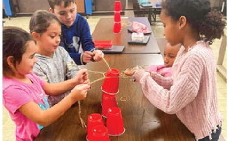 Gifted and Talented students complete ‘cup challenge,’ play human tic-tac-toe