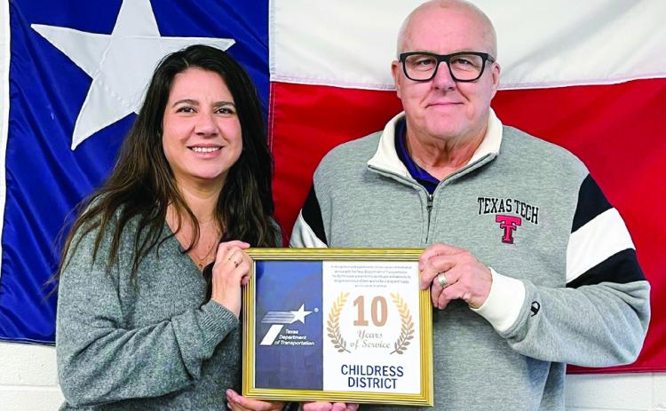 Childress District of the Texas Department of Transportation’s (TxDOT) Annabel Jurado, left, accepts an award for 10 years of service from TXDOT Childress District Engineer Darwin Lankford. Photos Courtesy of TxDOT Childress District