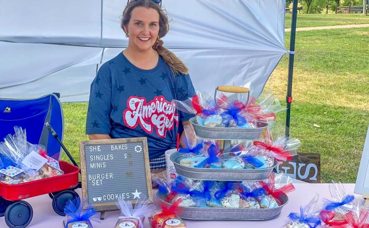 She Bakes Cookies and Cakes, LLC’s Shelby Parr sets up a booth at the 2022 Fourth of July Party in the Park Event. This year, the event, which will welcome over 30 vendors, will take place from 5-9 p.m. Tuesday, July 4 in Fair Park. Photo by Shelby Bocanegra