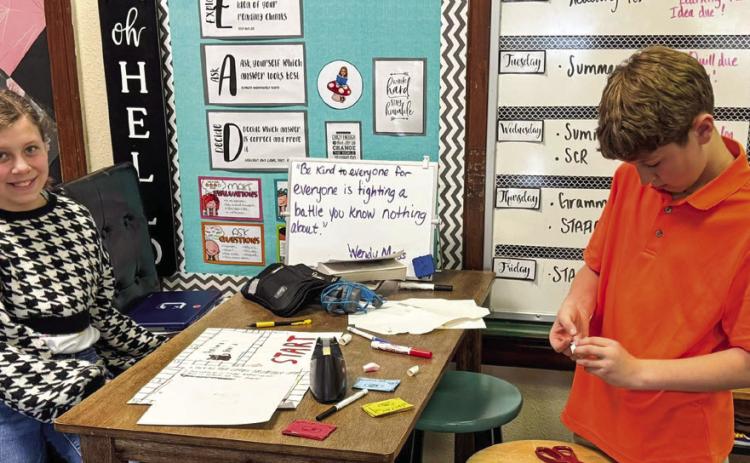Ready,set,play: Elementary students craft boardgames