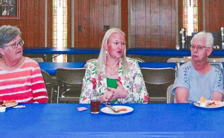 Applegate Quality Assurance Manager Adria Holter, center, discusses the importance of food safety protocol from the supplier to the dining table at the recent Adult Fellowship Luncheon at the Childress Methodist Church Fellowship Hall. With Holter are Sabrina Landrum, left, and Dianne Phillips, right. Grace Holman