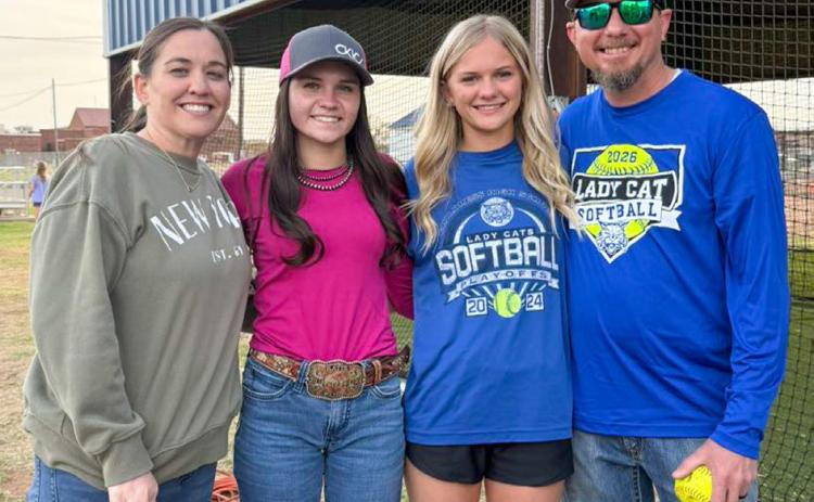 The Childress Lady Cat softball team enjoys a family and team dinner, hosted by parents of the players, Monday, March 23.