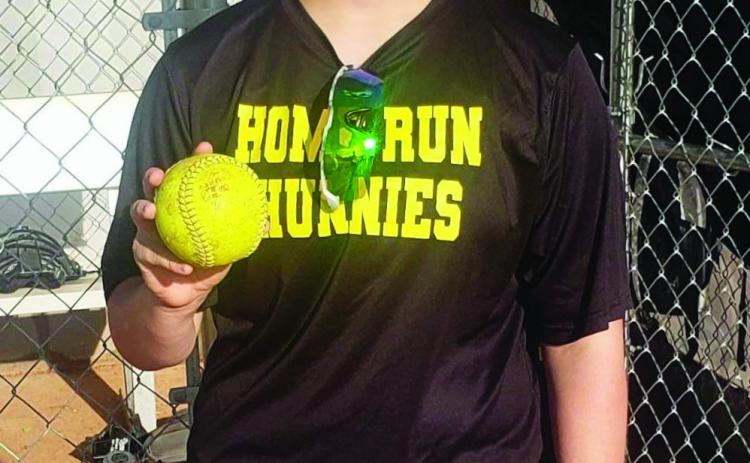 Landry Hunter, a member of the Homerun Hunnies, knocks the first homerun on the newly renovated Risenhoover Field. Courtesy Photo