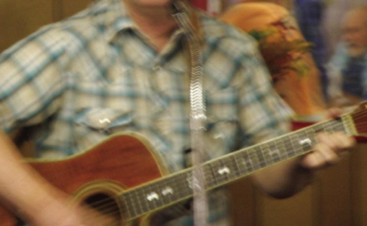 Jeff Pastor, of Wellington, performs hymns at the annual Thanksgiving Luncheon Thursday, Nov. 16 at the Childress Senior Citizens Center. In addition to self-accompaniment, his selections featured two of his own songs, “Hold On” and “There’s Room At The Altar.” Pastsor, a disabled veteran, serves as the chaplain for the Glynn Moore Veterans of Foreign Wars (VFW) Post 6439. His wife, Alice Pastor, was among the approximant 100 individuals at the luncheon. Photo by Grace Holman