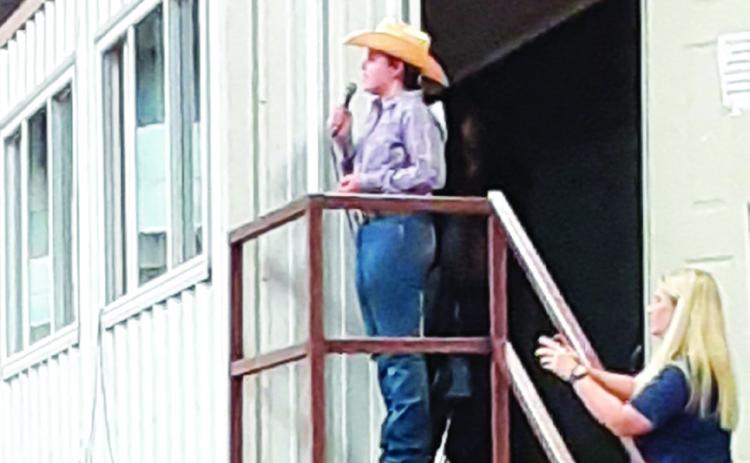 Monson Music Studio’s Ava Barlow, the 12-year-old granddaughter of Kerry and Melissa Barlow, of Quail, performs the national anthem at the Childress County 4-H Horse Club Playday last Sunday, Nov. 24 at the Mashburn Event Center and Arena. Courtesy Photo