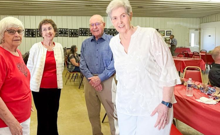 Zenith Swift Hickey, left, Barbara Lennon Roberson, Garth Lewis and Judy Ellis Lemons reminisce during the 69th Annual Dodson Ex-Student reunion Saturday, May 23. COURTESY PHOTO