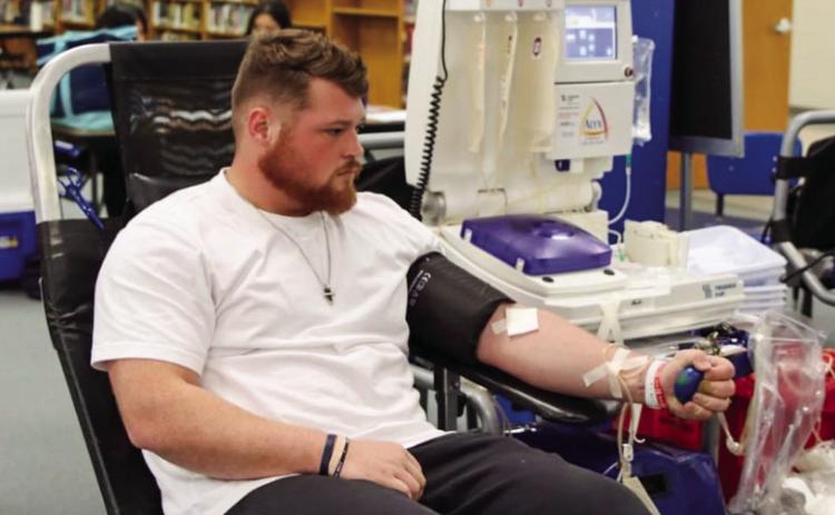 Childress High School (CHS) Coach Caleb Smith donates blood at the recent blood drive, hosted by CHS Student Council Thursday, Feb. 2. According to CHS administrators, the blood drive was a success. Courtesy Photos