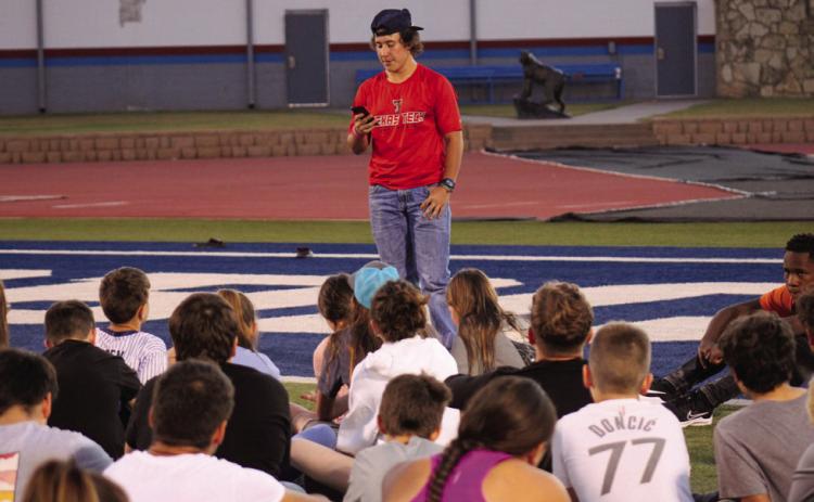 Childress High School sophomore Owen Dill speaks to fellow student-athletes at the recent Fellowship of Christian Athletes Fields of Faith event Wednesday, Oct. 12. For additional photos, see 10A. The Red River Sun/Elizabeth Tanner