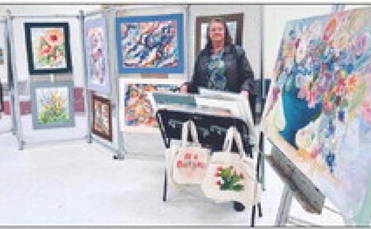 Moore Art Studio owner and artist Belinda Moore showcases her work at the recent art show Saturday, April 22. Photos Courtesy of For The Hub Of Art