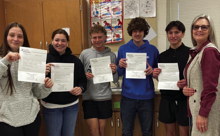 Educator Amy Detwiler and coach Grace Well’s Childress High School students complete AgriLife Extension’s Food Safety course, as well as take the state-approved exam, to receive their Food Handlers certification, which is valid for two years. From left: Reanna Dodson, Kennedy Smithwick, Kashton Patterson, Kadin Hendren, Isaac Torres, Childress County Extension Agent Dawn Dockter. Not pictured is Thomas Votaw. Photos Courtesy of Childress County Texas A&amp;M AgriLife Extension