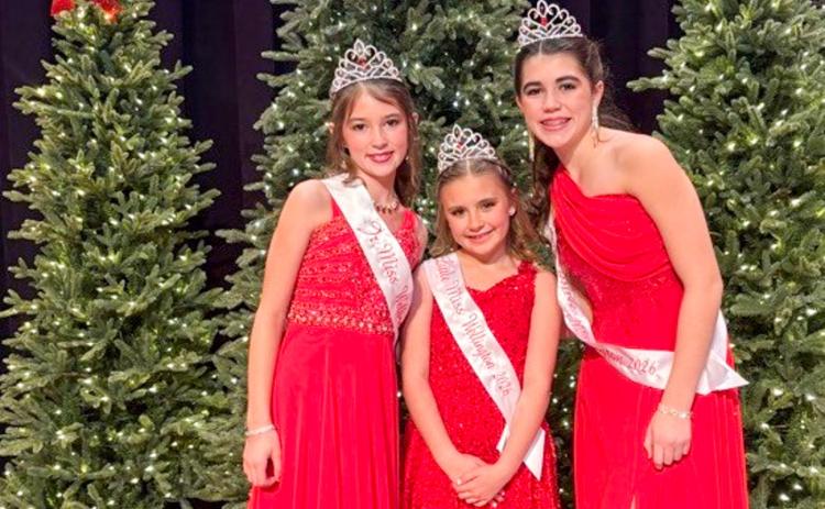 Junior Miss Wellington 2026 Peyton Roberson, left, Little Miss Wellington 2026 JoLee Breedlove and Teen Miss Wellington 2026 Quinn Roberson center the stage of the elegantly attired Wellington Ritz Theatre following the Sunday afternoon, Dec. 14 pageants. Wellington High School