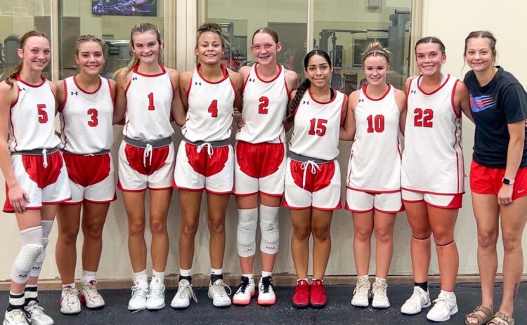 The Wellington Lady Rocket varsity team traveled to the recent Lubbock Christian University campus to work on fine tuning basketball skills with Lady Chap coaches and players during a fun and competitive summer camp. From left: Taytum Kane, Gannon Guy, Kambrie Fisher, Raelynn Castor, Kaesyn Kane, Aundrea Garcia, Dixie Johnson, Ceighley Killian, Maci Brewer. COURTESY PHOTO