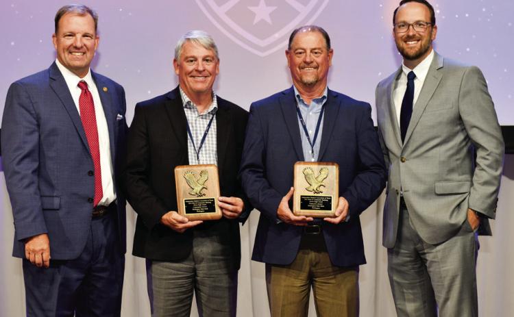 Wellington State Bank Chief Credit Officer Jeff Lloyd and Chief Lending Officer Forrest Lloyd accept Best of Community Banking Silver Eagle Awards from Independent Bankers Association of Texas (IBAT) President and CEO Christopher Williston VI and Immediate-Past IBAT Chairman Kyle Irwin. Photo Courtesy of Independent Bankers Association of Texas
