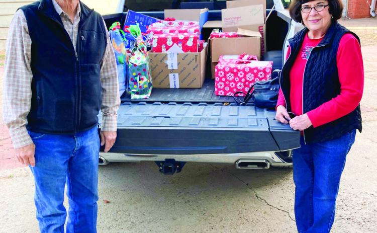 Childress County Christmas Sharing’s Melvin and Sarah Long deliver gifts to Childress Healthcare Center and Cottage Village Assisted Living Facility just in time for the holiday season. Photos Courtesy of Childress County Christmas Sharing
